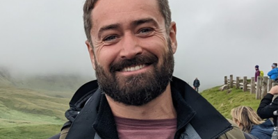A headshot of Labhrás Quigley